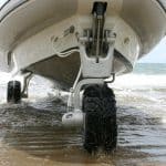 Designed to ease the transition between land and sea, a Sealegs boat features retractable wheels that allow you to drive right into the water
