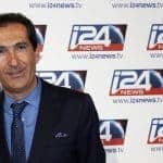 Drahi, Franco-Israeli businessman and founder of Numericable, poses during a roadshow for the Israel-based broadcast news channel i24 News in Paris