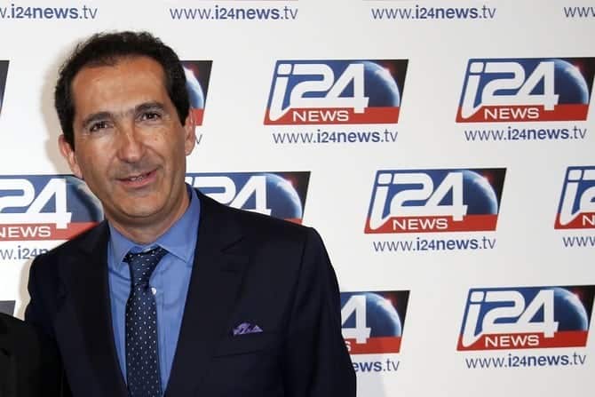 Drahi, Franco-Israeli businessman and founder of Numericable, poses during a roadshow for the Israel-based broadcast news channel i24 News in Paris