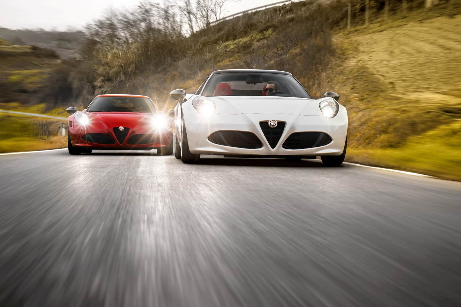 2016 Alfa Romeo 4C (left) and Alfa Romeo 4C Spider (right)