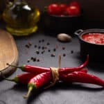 Chile pepper and tomato sauce ingredient for homemade cooking on